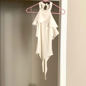 White body suit with ruffles
